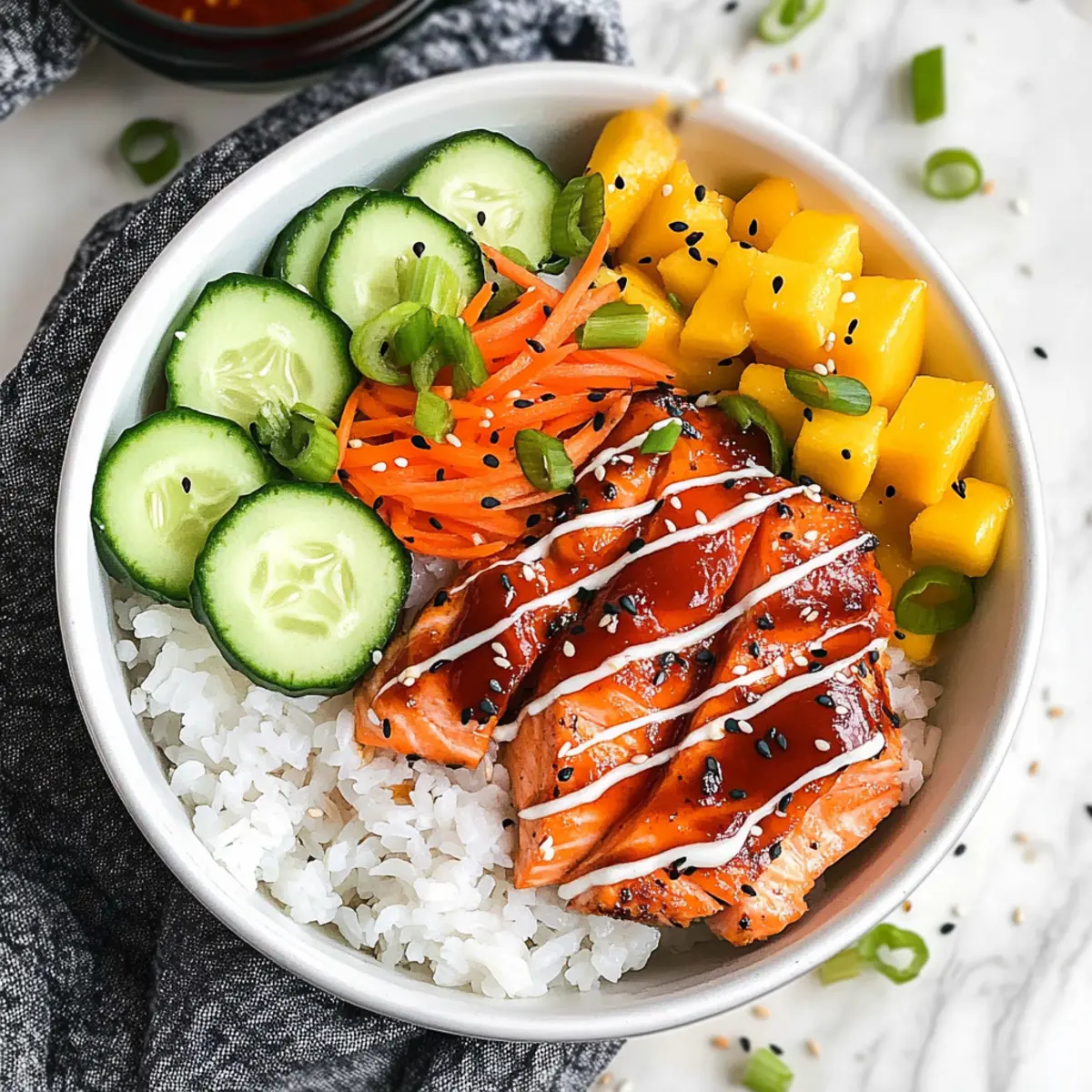 Spicy Sriracha Salmon Bowls for a Bold, Flavorful Dinner 4 e8bf7a53 b59b 408a 9e94 f06ebc259efcbr kp8ptk
